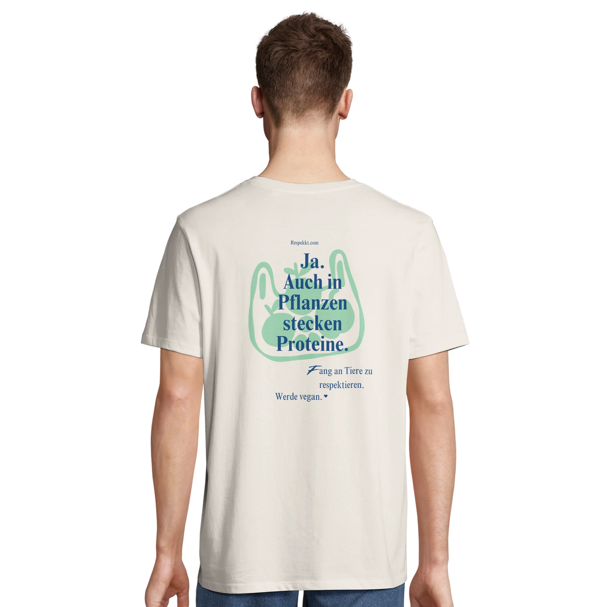 Prson, die ein weißes T-Shirt trägt mit dem Aufdruck: "Ja. Auch in Pflanzen stecken Proteine. Fang an Tiere zu respektieren. Werde vegan."